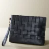 Leather Strap In Clutch