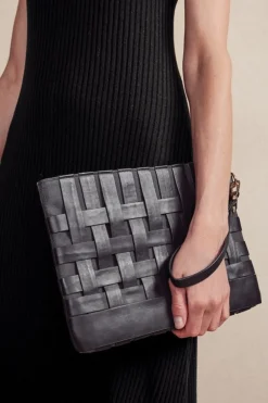 Leather Strap In Clutch